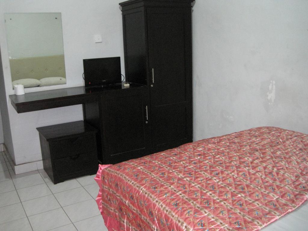 Taman Mekar Beach Inn Kuta Lombok Rum bild